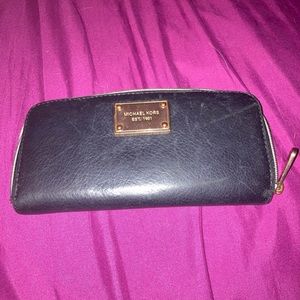 Michael kors rose gold and black leather wallet
